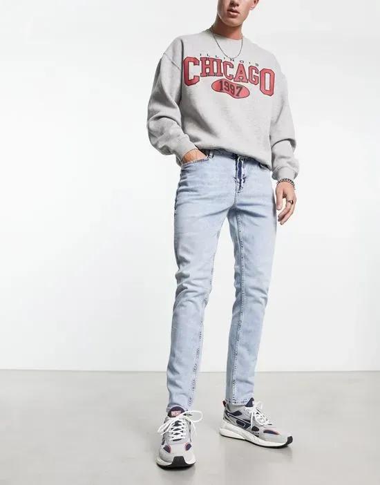 skinny jeans in Y2K light wash blue