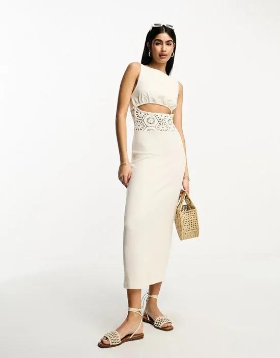 sleeveless maxi dress with cut out waist and crochet insert in cream