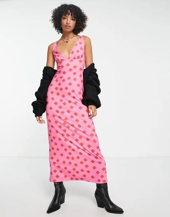 sleeveless v neck maxi dress in pink and red geo print