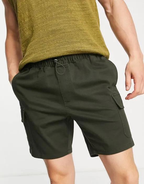 slim cargo shorts in dark green