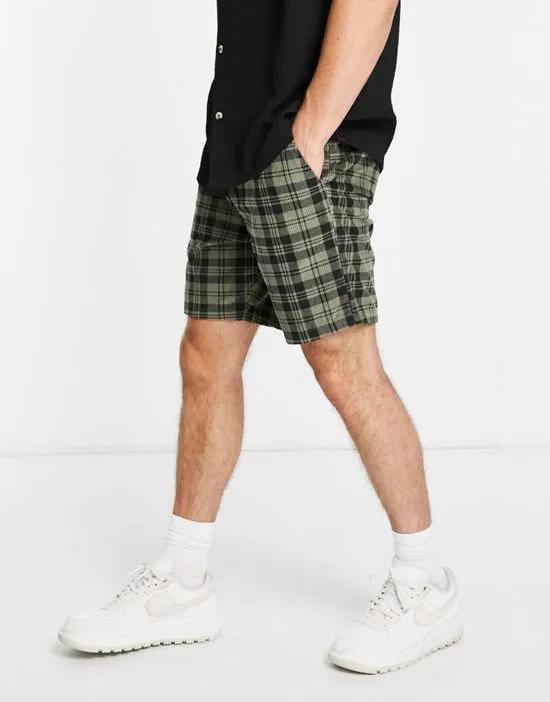 slim shorts in green plaid cord