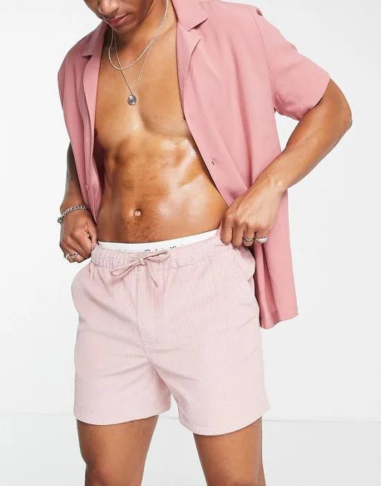 slim shorts in pink cord