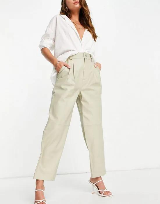 slouchy leather pants with seam detail in clay