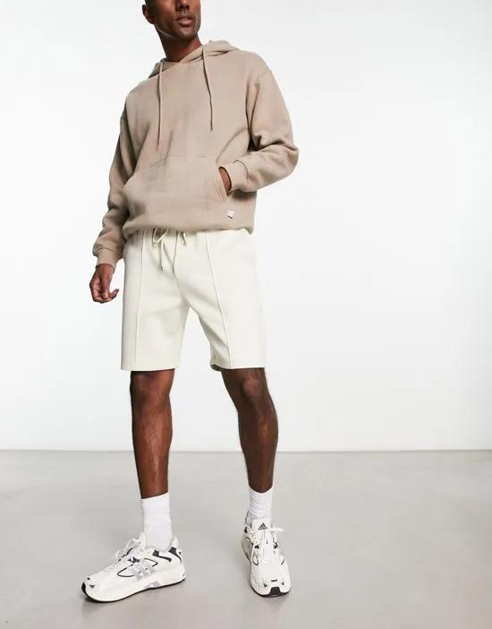 smart slim shorts in beige scuba