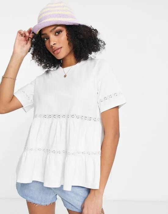smock top with lace detail in white