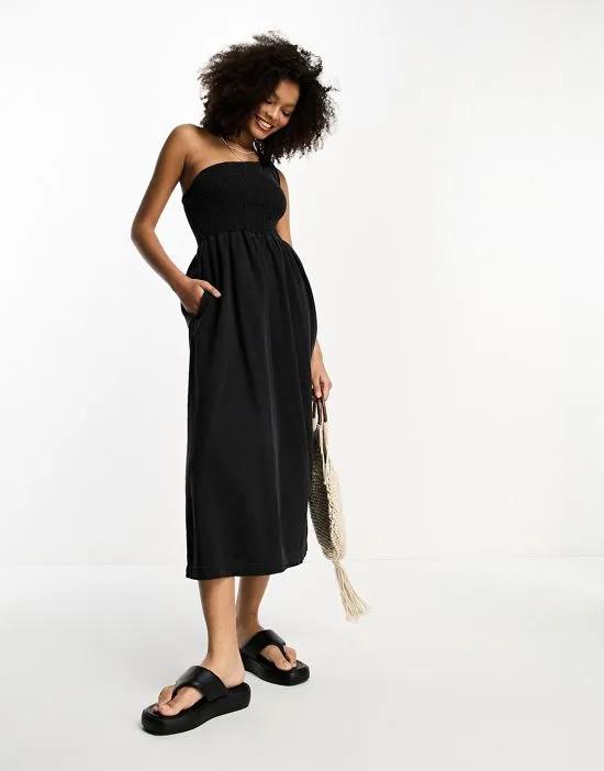 soft denim midi dress with asymmetric neckline in washed black