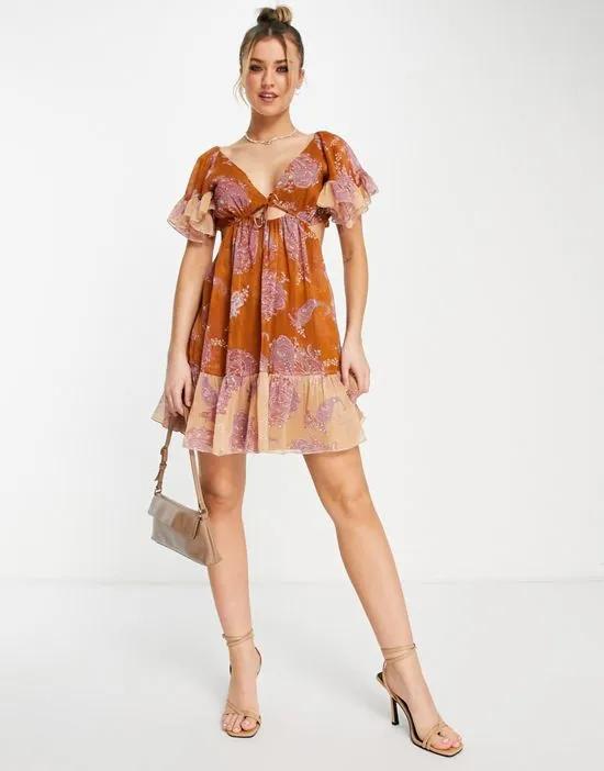 soft tiered mini dress with tie front in mixed paisley print