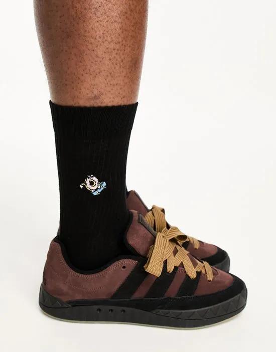 sports socks in black with donut embroidery