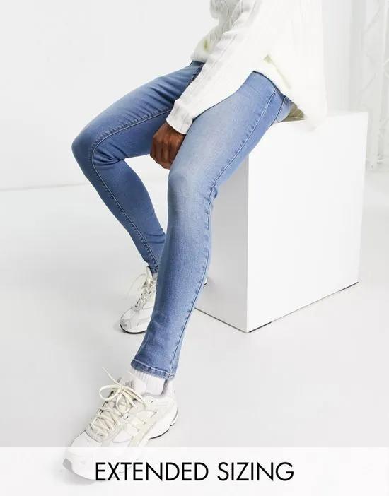 spray on jeans with power stretch in mid wash blue