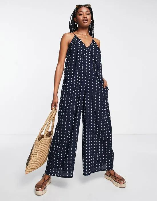 strappy jumpsuit with ruched neck in textured print