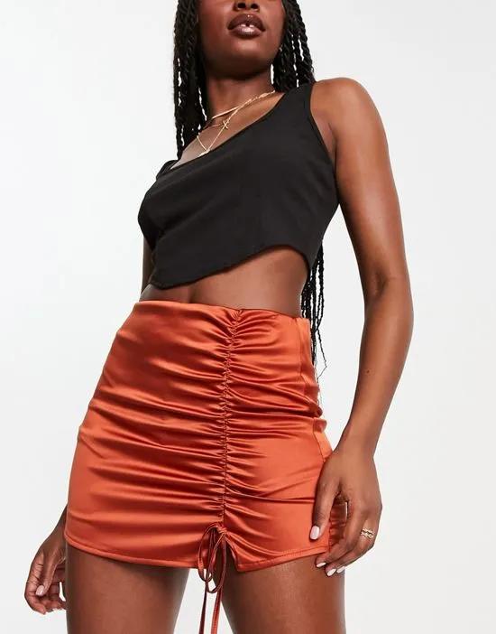 stretch satin ruched skort in rust