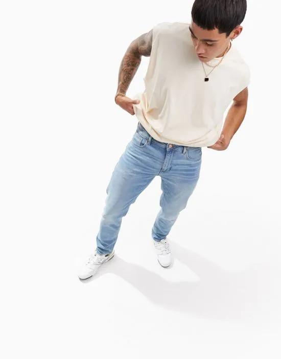 stretch slim jeans in light wash blue