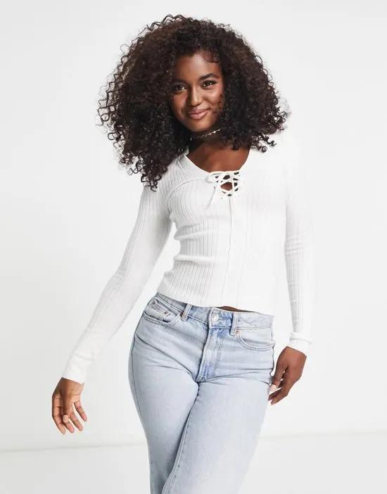 sweater with lace up detail in cream