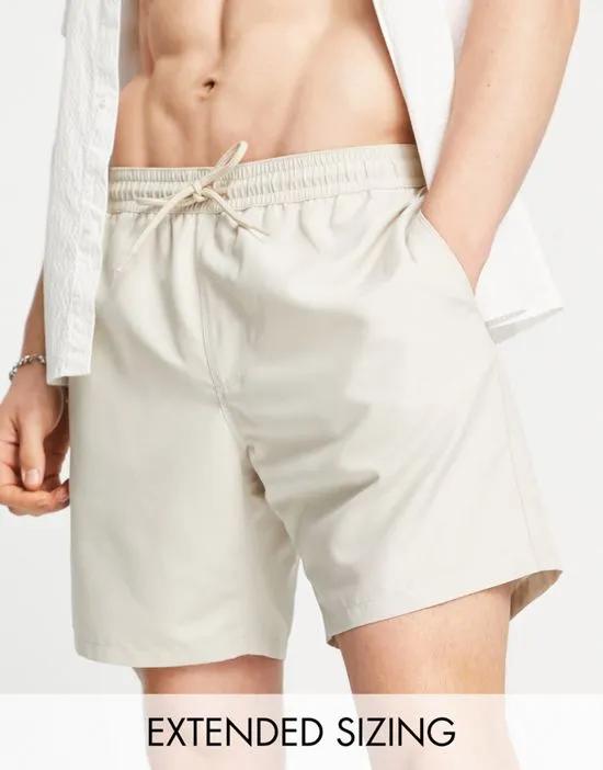 swim shorts in mid length in beige