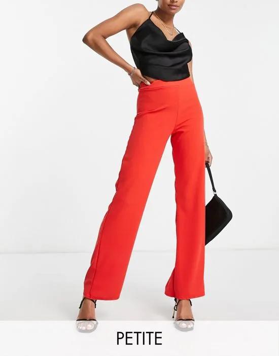 tailored pants in tomato red