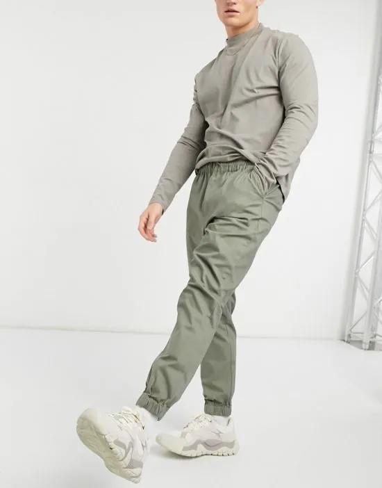tapered chino sweatpants with elasticized waist in khaki