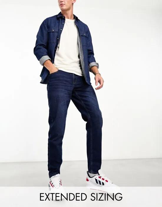 tapered jeans in dark wash blue