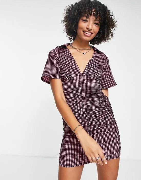 textured short sleeve ruched mini dress in pink check