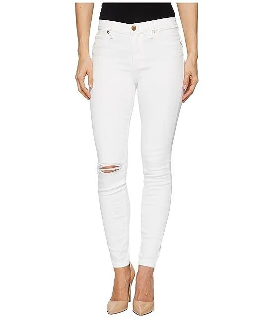 The Bond Mid-Rise Distressed Skinny in Great White