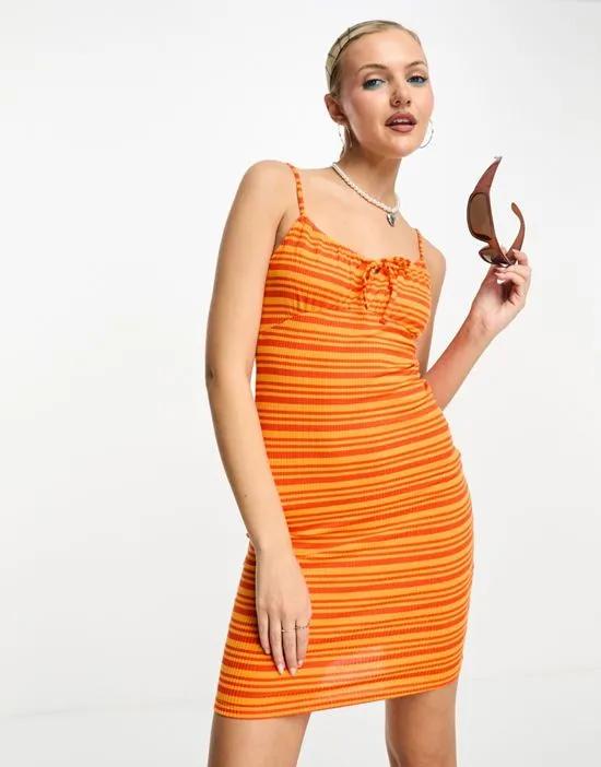 tie front cami mini dress in orange stripe