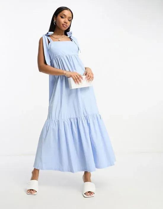 tiered midi dress with tie straps and cutout back in blue poplin