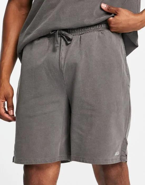 training shorts in oversized fit and pigment wash