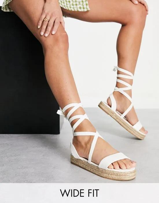 Truffle Collection wide fit tie leg espadrille sandals in white