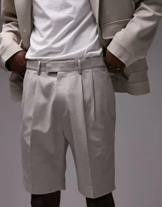 twin pleat linen shorts in stone