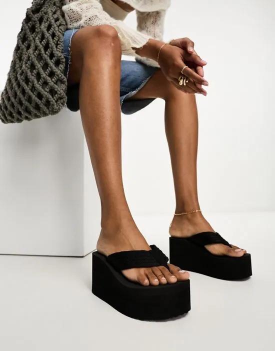 Tye toe thong wedge sandals in black