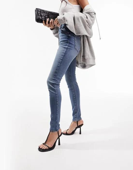 ultimate skinny jeans in distressed blue