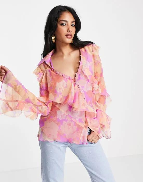 v neck ruffle blouse with frill detail and button edge in pink pastel floral print