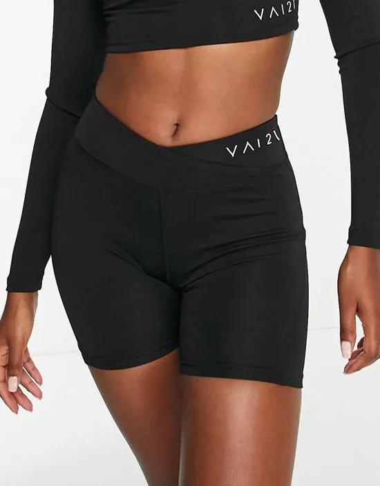 V shape waist longer length shorts in black - part of a set