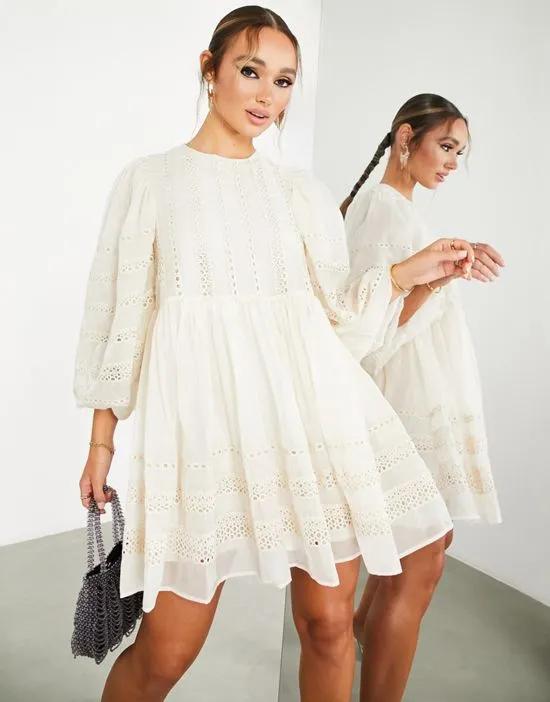 volume sleeve mini smock dress with linear lace trim in cream