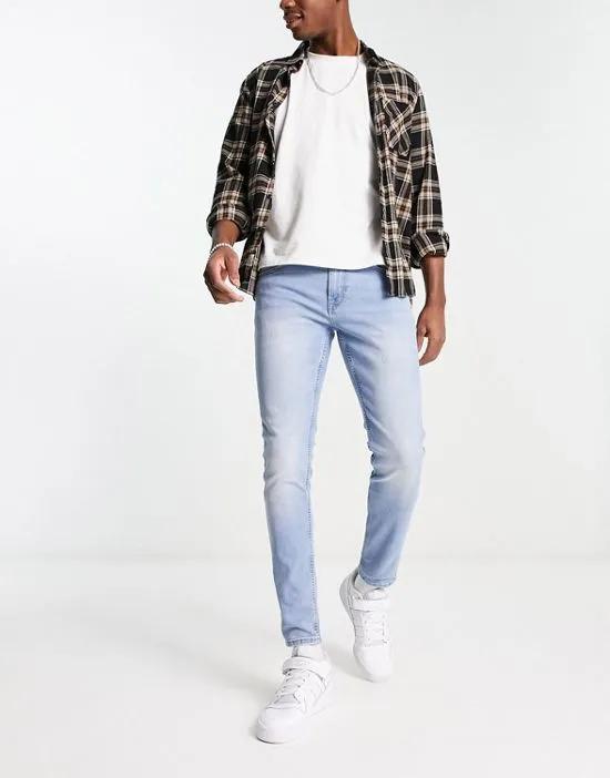 warp skinny fit jeans in light wash