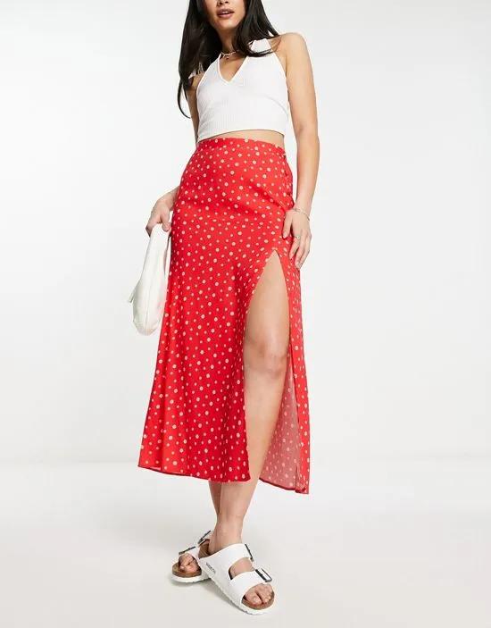 wrap midi skirt with button detail in red ditsy floral