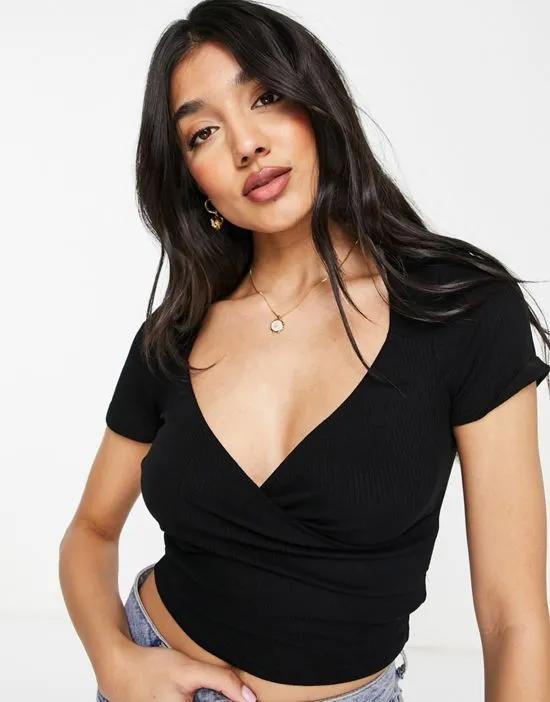 wrap top with cap sleeve in rib in black