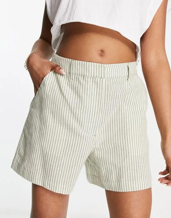 x Julie Ferreri high rise linen shorts in green stripe