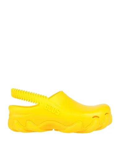 Yellow Mules and clogs