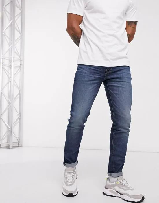512 slim tapered fit jeans in blue wash