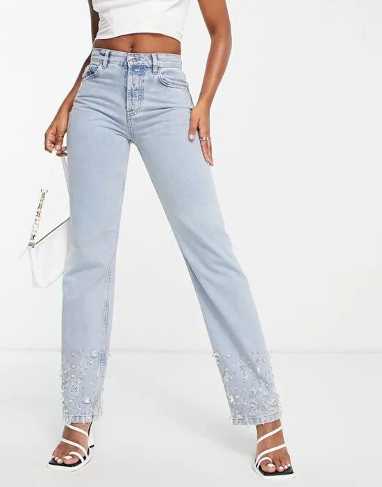 90s straight jeans in light blue with embelished hem