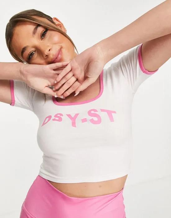 Active crop top in white and pink