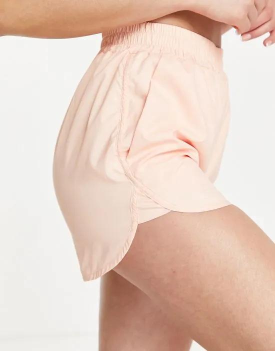 Active woven runner shorts in peach