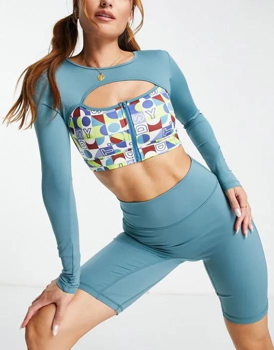 Active zip front long sleeve top in blue and multi