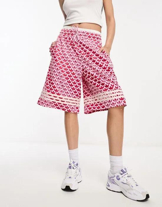 adidas Adicolor Modern 70s Monogram shorts in pink