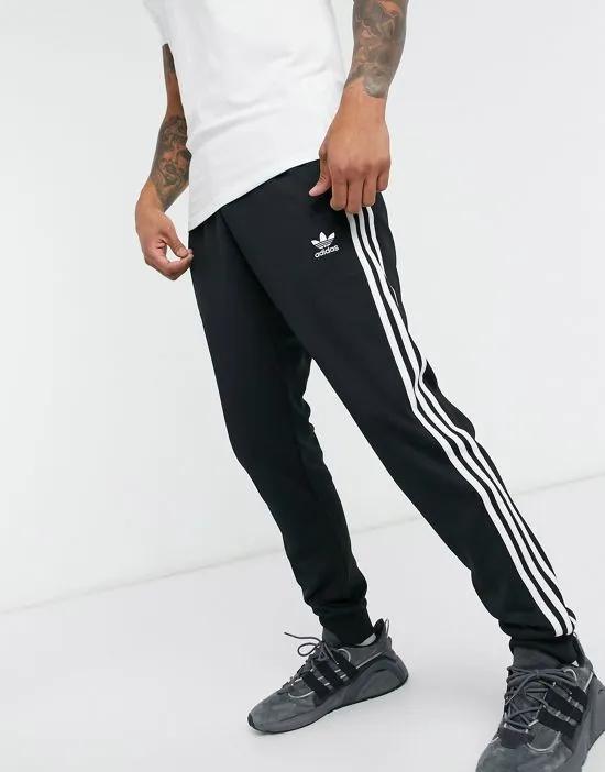 adidas Originals adicolor three stripe skinny sweatpants in black