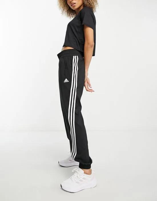 adidas Training Train Icons 3 stripe sweatpants in black