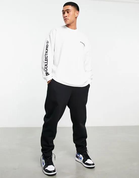 ASOS Dark Future oversized long sleeve T-shirt with blurred logo graphic print in white