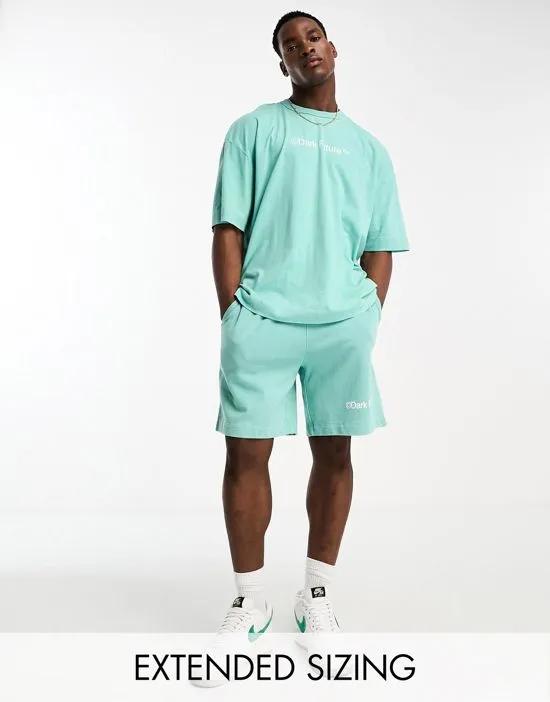 ASOS Dark future relaxed short with logo print in washed green - part of a set
