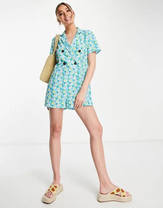 ASOS DESIGN bubble crepe double breasted smock romper in blue daisy