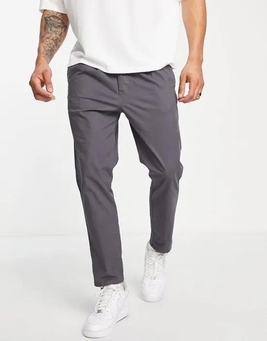 ASOS DESIGN cigarette chinos with pleats in charcoal